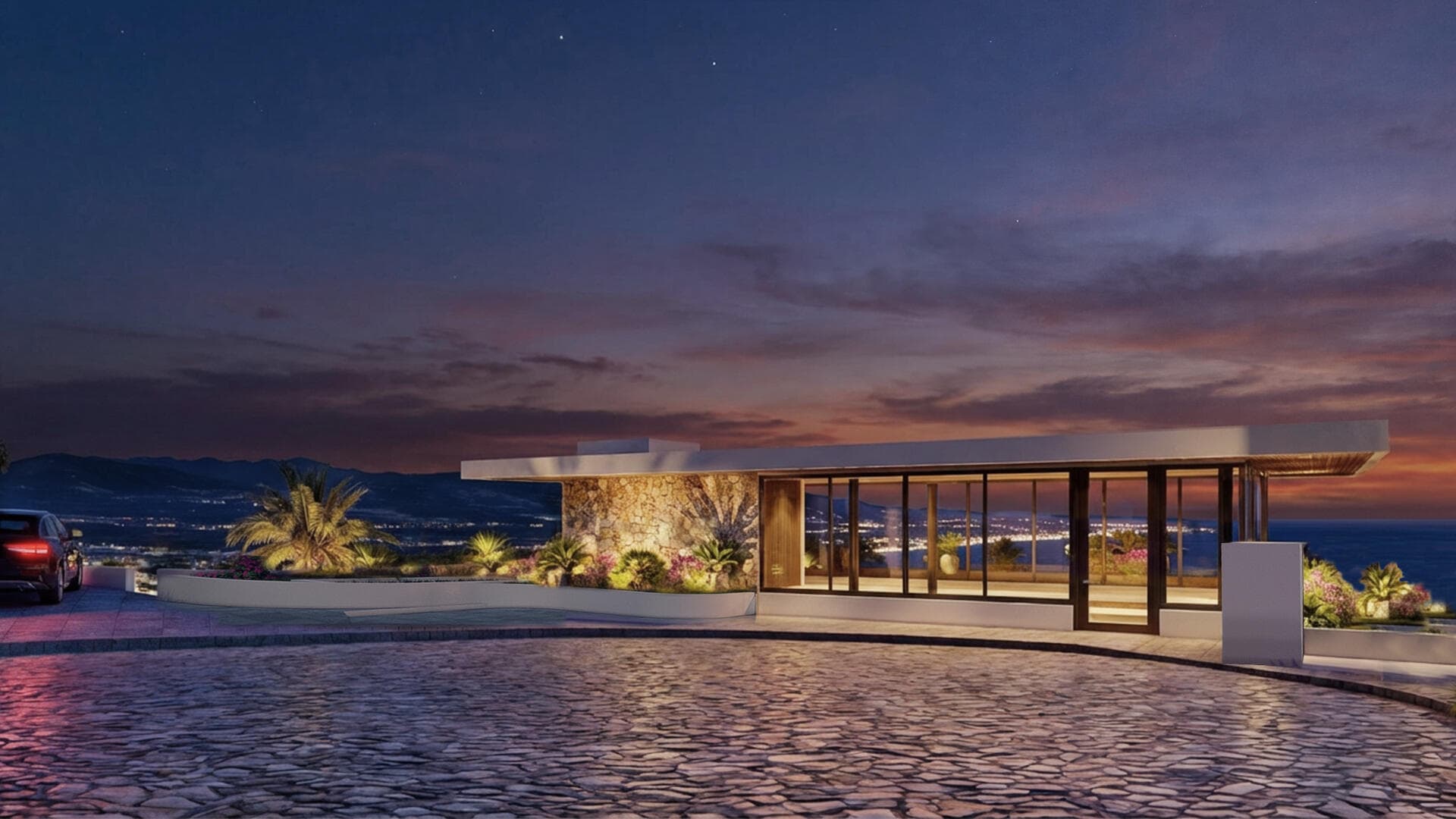 Villa del León arrival at dusk in Pedregal — pavilion, stone wall, motor court