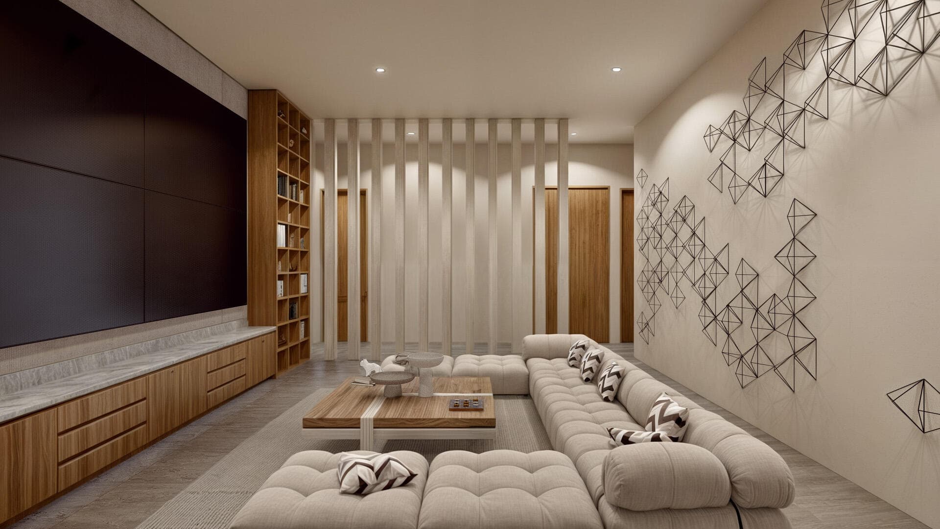 Villa del León media room in Pedregal, Cabo — sectional seating and millwork