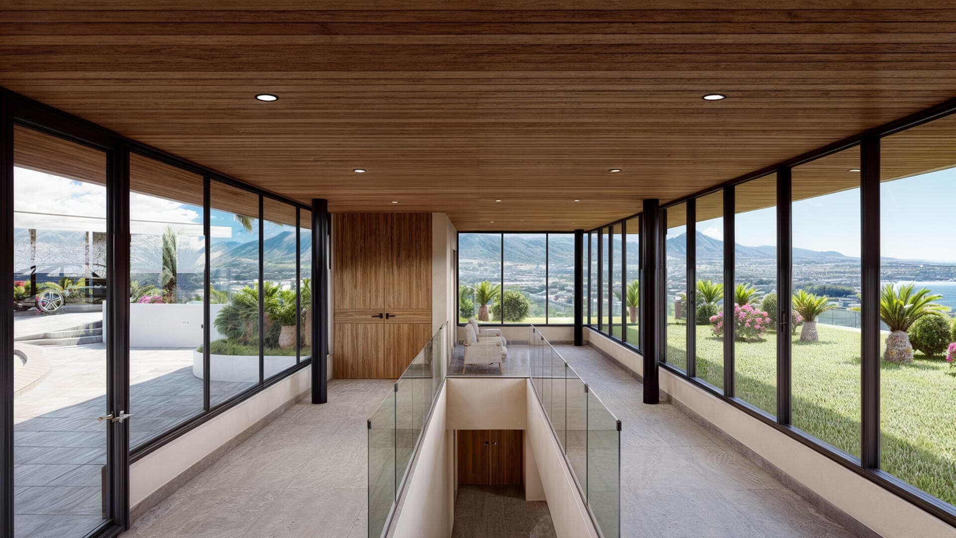 Villa del León mezzanine corridor in Pedregal, Cabo — glass and wood