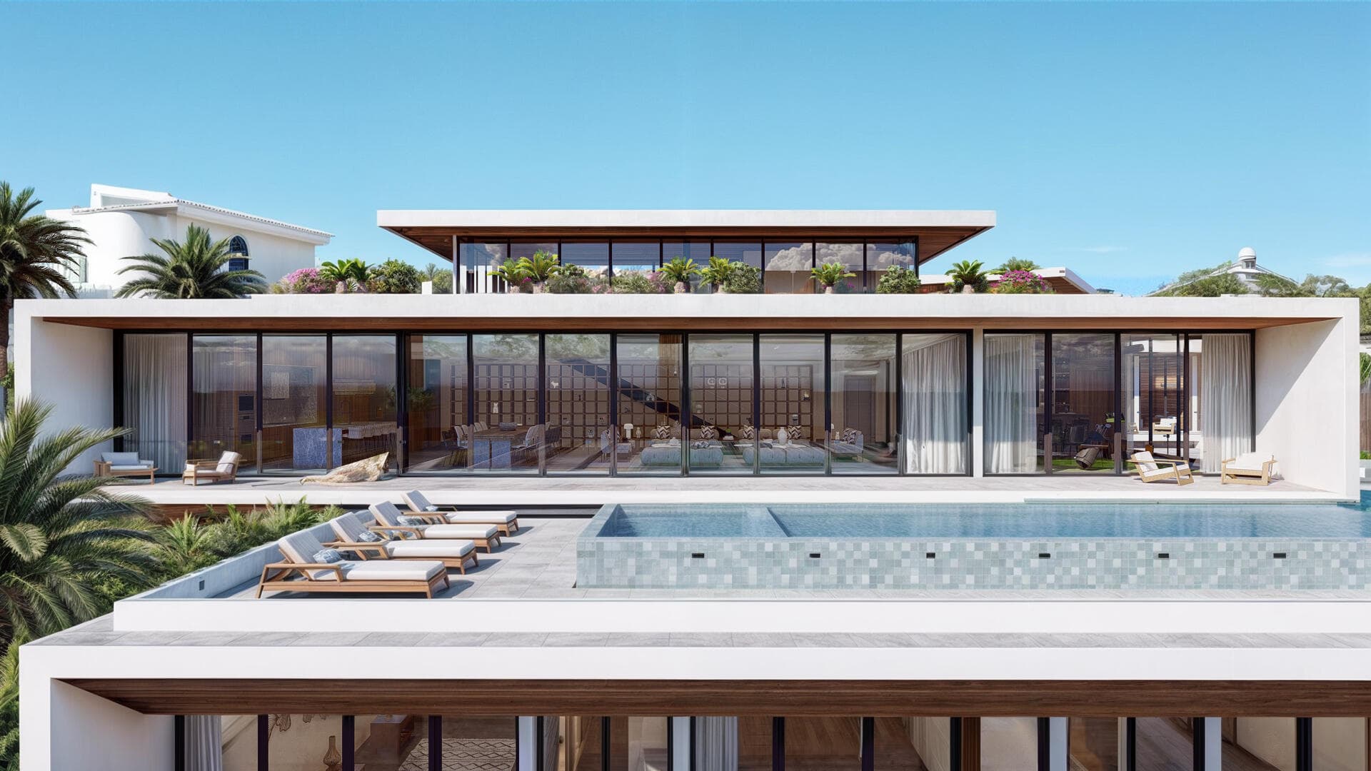 Villa del León daytime exterior in Pedregal, Cabo — infinity pool and sun loungers